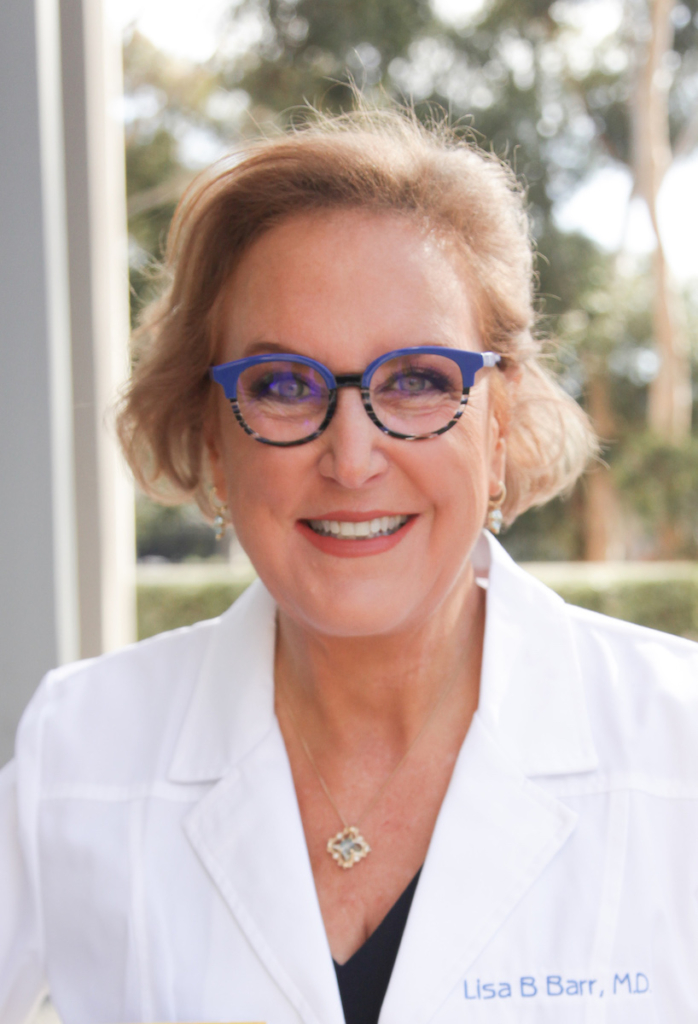 Dr. Lisa Barr providing functional medicine consultation in Virginia Beach